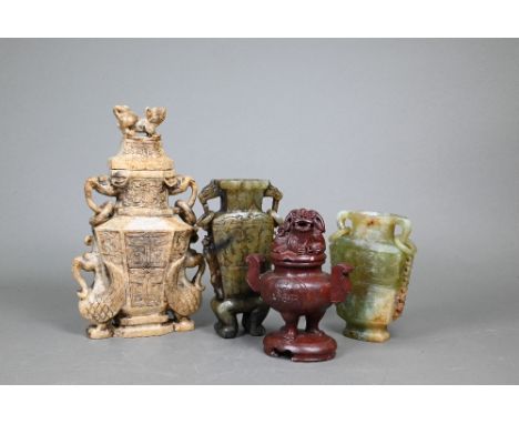Two Chinese carved green hardstone archaistic vessels with ring handles, 18 cm and 14 cm high to/w another somewhat similar e