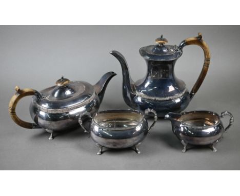 A heavy quality silver four-piece tea/coffee service with simulated ivory handles and chased pad feet, H.L. Brown &amp; Son, 