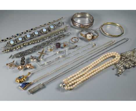 A collection of jewellery items including 9ct gold cross, gold cased wristwatch, 9ct signet ring, 9ct knot earrings, approx 8