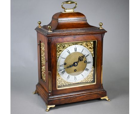 A 19th century brass mounted mahogany bracket clock, the three train movement striking on eight bells and a coiled gong, the 