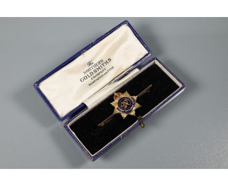 A George V Royal Army Service Corps bar brooch, yellow metal stamped 9ct and blue and red enamels, 5.5 cm long, approx 4.8g a