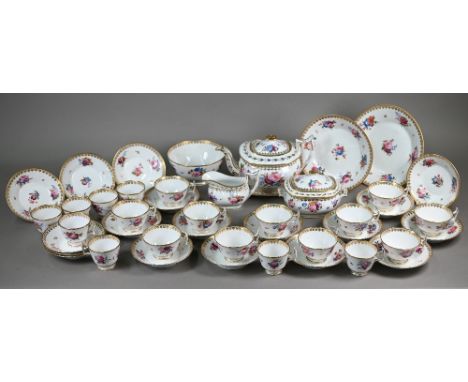 A Regency Staffordshire china part tea service with floral painted and gilded decoration, comprising eleven tea cups, eight c