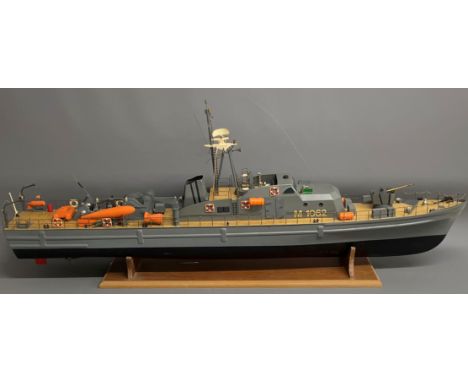 Large hand built scale model of a mine hunter M 1062 ship with remote control with stand &amp; two travel boxes. Length 116cm