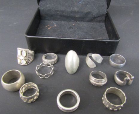 13 silver rings including a Tiffany ring in a box. Total weight 2.52 ozt