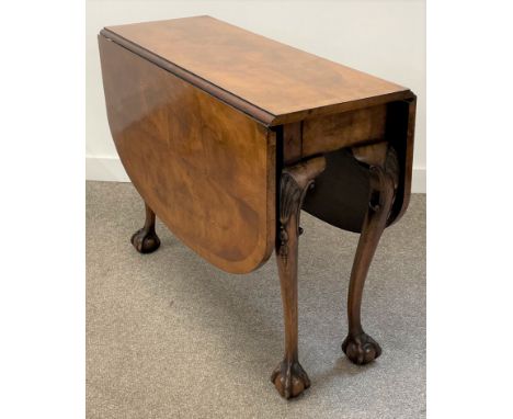 Early 20th century Queen Anne style gate leg table in walnut with carved shells motif & ball & claw feet, Dimensions 123cm by