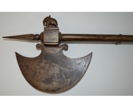 Indian axe with crescent shaped blade surmounted by an elephant, with concealed blade, approx 56cm