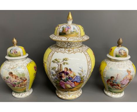 Large early 20th century lidded vase &amp; a pair of smaller similar lidded vases, possibly Sitzendorf, decorated with yellow