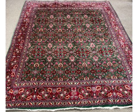 Large red &amp; green ground wool carpet 3.0m by 2.2m