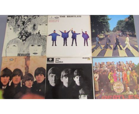 Collection of Beatles LPs including Help, Abbey Road, Revolver, Sgt. Peppers Lonely Heart Club, With the Beatles and Beatles 