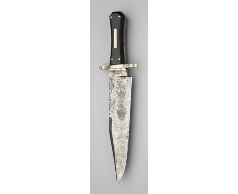 A BOWIE KNIFE, GEORGE WOSTENHOLM &amp; SON, WASHINGTON WORKS, SHEFFIELD, 20TH CENTURY with broad blade formed with a clipped-