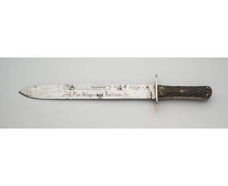 A MASSIVE EXHIBITION HUNTING KNIFE, GEORGE WOSTENHOLM &amp; SON, WASHINGTON WORKS, I.XL, LATE 19TH CENTURY with long blade fo