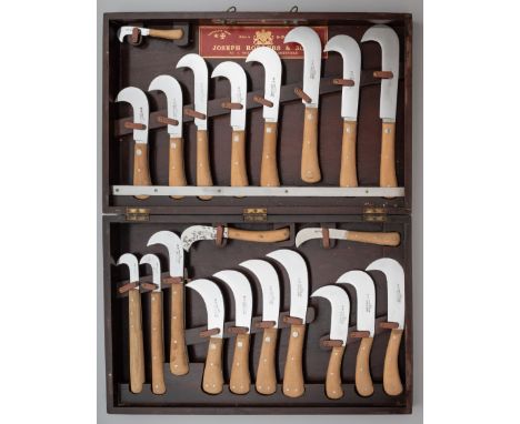 A CASED SET OF TWENTY-ONE CLEAVERS, PERHAPS FOR PLANTATION USE, JOSEPH RODGERS &amp; SONS, CUTLERS TO HIS MAJESTY, 6 NORFOLK 