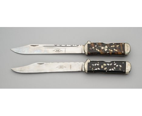 ˜ TWO FOLDING BOWIE KNIVES, JOHN PETTY, SHEFFIELD, 20TH CENTURY of exhibition quality, almost forming a pair, each with long 