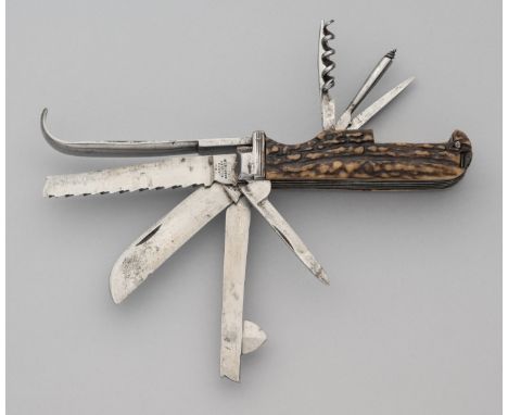 A COACHMAN’S KNIFE, JAMES RODGERS, SHEFFIELD, MID-19TH CENTURY with eleven folding elements including signed blade, saw, farr