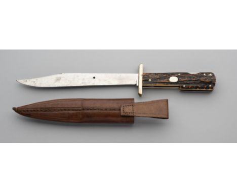 A MILITARY STYLE FOLDING KNIFE, A. MORTON, SHEFFIELD, LATE 19TH CENTURY with folding locking blade formed with a clipped-back