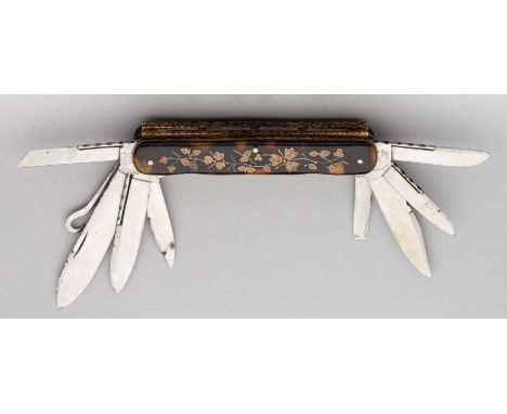 A FOLDING POCKET KNIFE, JOHN PETTY & SONS, SHEFFIELD, LATE 19TH CENTURY with nine folding blades and accessories, including p
