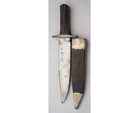 A MASSIVE BOWIE KNIFE, SIMPSON, 55 STRAND, LONDON, THIRD QUARTER OF THE 19TH CENTURY with heavy single-edged blade formed wit