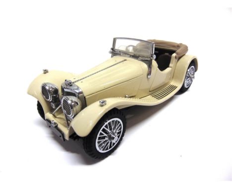 A 1/24 SCALE FRANKLIN MINT 1938 JAGUAR SS-100  cream, generally very good condition (passenger seat detached; slightly dusty)