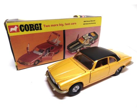 A CORGI NO.286, JAGUAR XJ12C metallic orange-yellow, very near mint, boxed, the box generally good (inner plinth flattened).