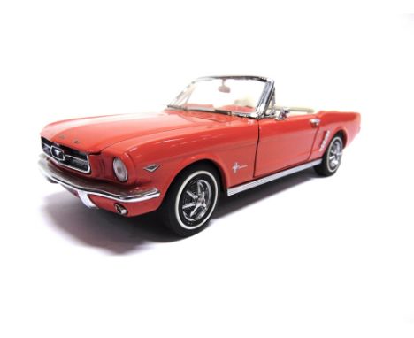 A 1/24 SCALE FRANKLIN MINT 1964 FORD MUSTANG  red, generally good condition (one windscreen wiper broken and the other bent; 