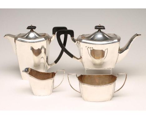 AN ART DECO FOUR PIECE SILVER TEA AND COFFEE SERVICE, maker Barker Bros. Ltd., Birmingham 1938 (coffee pot) and 1939, of roun