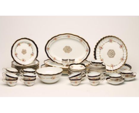A MEISSEN PORCELAIN PART DINNER AND TEA SERVICE, early 20th century, painted in polychrome enamels with flowerheads within a 