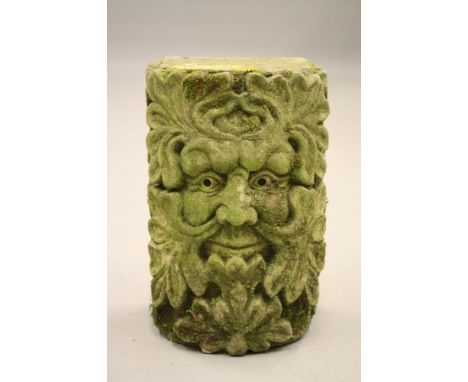 A CARVED SANDSTONE "GREEN MAN" MASK of demi lune form as an architectural support, 9" x 8" x 14 1/2" (Illustrated) (Est. plus