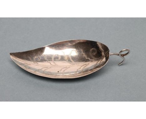 A GEORGE III SILVER CADDY SPOON, maker's mark J.S., London 1800, in the form of a leaf with wriggle work veins and wirework l