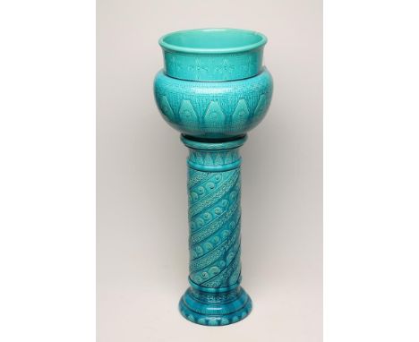 A BURMANTOFTS FAIENCE TURQUOISE GLAZED JARDINIERE AND MATCHED STAND, c.1900, the baluster jardiniere incised and stamped with