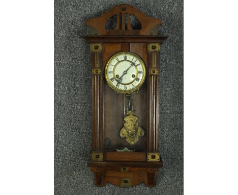 Wall clock, late 19th century mahogany with Art Nouveau style brass mounts. H.70 W.30 cm. 