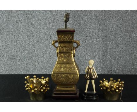 A Chinese Archaic style brass lamp and brass crown shaped bowls. Also, an Art Deco style figure. The lamp measures H.48 cm. 