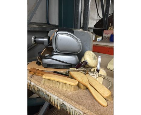 A VINTAGE PLANK PROJECTOR IN CASE, HMV HAIRDRYER AND STAND, BRUSHES, ETC 