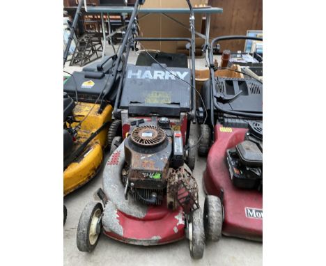 A PETROL ENGINE LAWN MOWER WITH GRASS BOX 