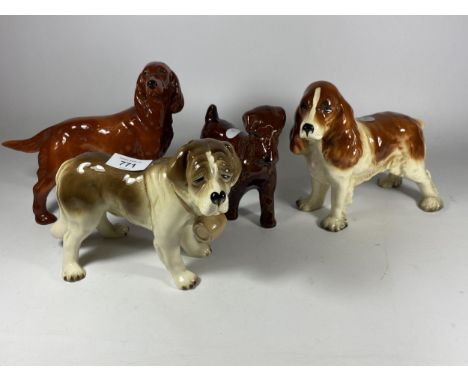 A GROUP OF FOUR COOPERCRAFT CERAMIC DOG FIGURES 
