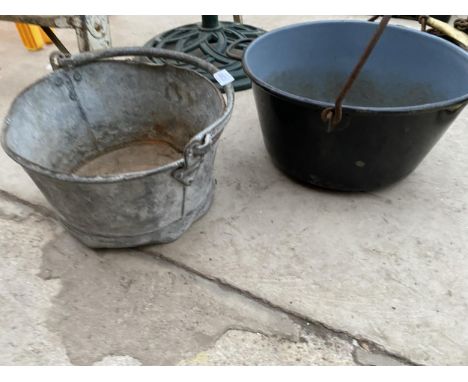 AN ASSORTMENT OF GALVANISED AND ENAMEL GRADUATED JAM PANS 