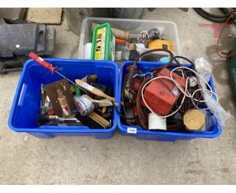 AN ASSORTMENT OF TOOLS AND HARDWARE TO INCLUDE A BATTERY CHARGER AND WIRE BRUSHES ETC 
