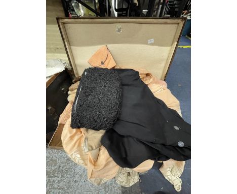 A VINTAGE SUITCASE CONTAINING A LARGE QUANTITY OF VINTAGE CLOTHING AND LINGERIE 