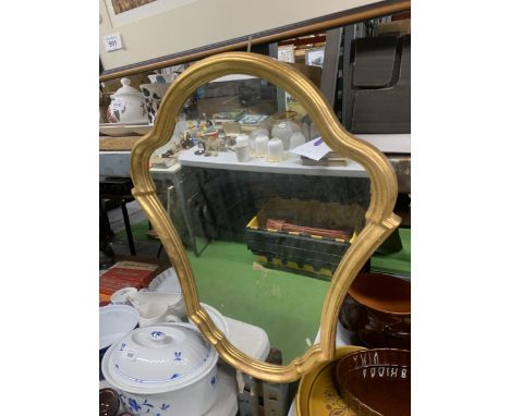 A VINTAGE STYLE SHIELD SHAPED MIRROR WITH GILT FRAME 