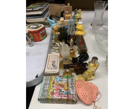 A LARGE QUANTITY OF VINTAGE COLLECTABLE 'AVON' BOTTLES TO INCLUDE ANIMALS, ETC 