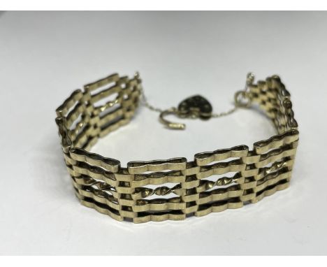 A SILVER FIVE BAR GATE BRACELET 