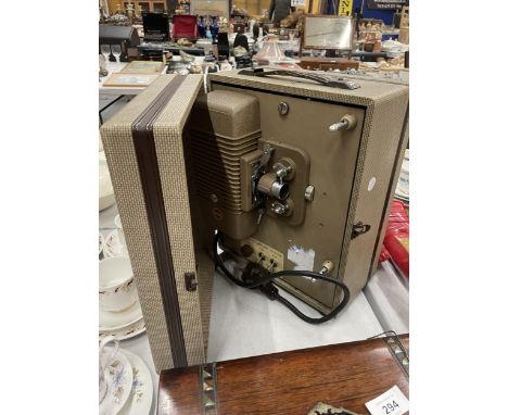 A KODAK PROJECTOR IN ORIGINAL CASE 