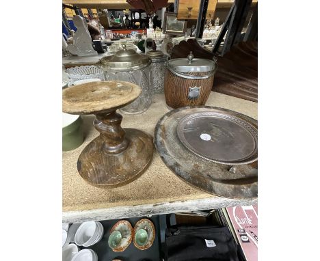 A QUANTITY OF TREEN ITEMS TO INCLUDE AN ICE BUCKET, BOWL AND BARLEY TWIST CANDLESTICK PLUS TWO GLASS BISCUIT BARRELS WITH PLA