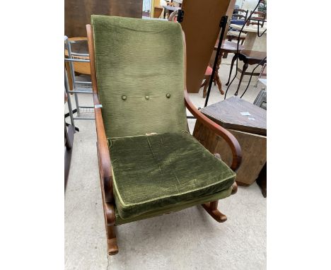 A PARKER KNOLL ROCKING CHAIR, MODEL NO. P.K.1038-9 
