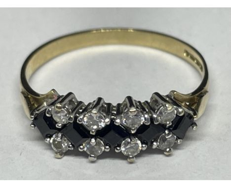 A 9 CARAT GOLD RING WITH FIVE SAPPHIRES AND TEN CUBIC ZIRCONIAS SIZE R/S 