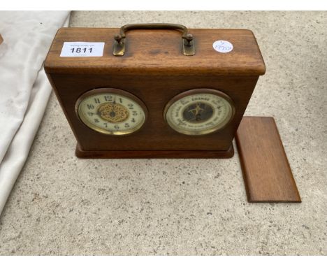 A VINTAGE WOODEN CASED MANTLE CLOCK AND BEROMETER 