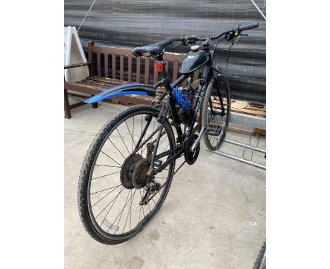 A GIANT PUSH BIKE WITH MOTORISED ENGINE 