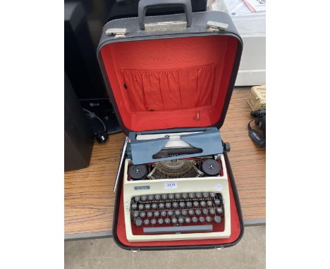 A RETRO ERIKA TYPEWRITER WITH CARRY CASE 