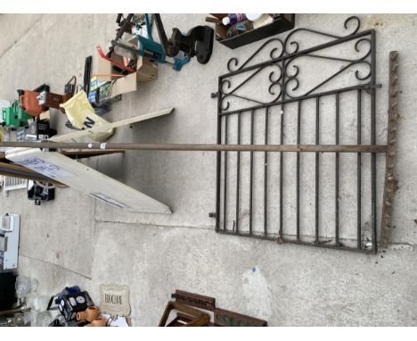 A LARGE WOODEN RAKE AND A WROUGHT IRON PEDESTRIAN GATE 