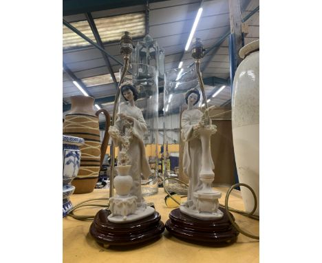 A PAIR OF LAMP BASES WITH ORIENTAL LADIES ON THE BASE 