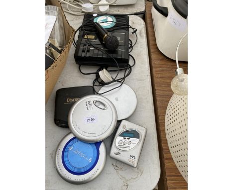 A CASSETTE RECORDER AND AN ASSORTMENT OF WALKMEN 